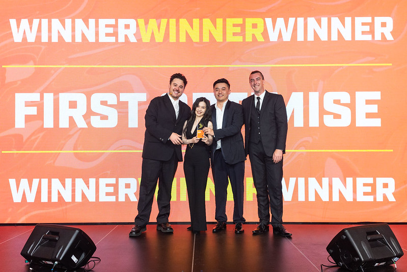 The First Optimise team on stage holding an award at the APAC Search Awards